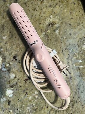L'ange Le Duo 360° Airflow Titanium Styler is a 2-in-1 hair styling tool Lange